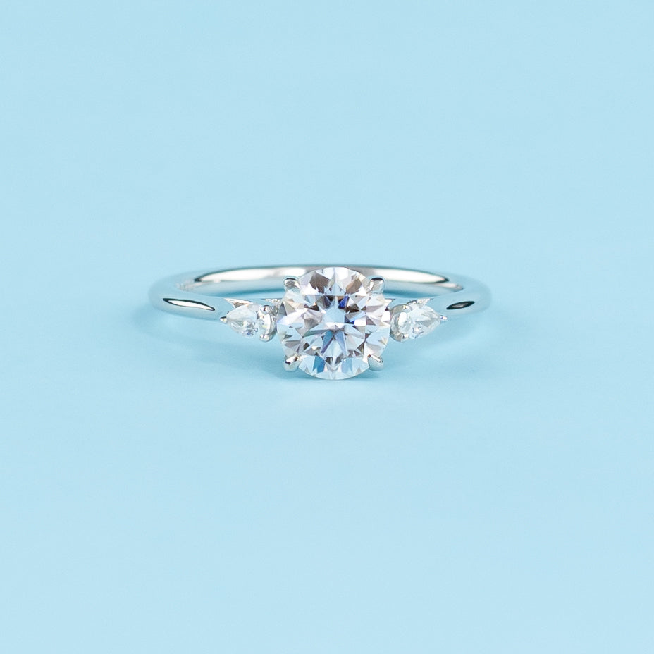 Infinite Love Trilogy Round Brilliant Moissanite Engagement Ring