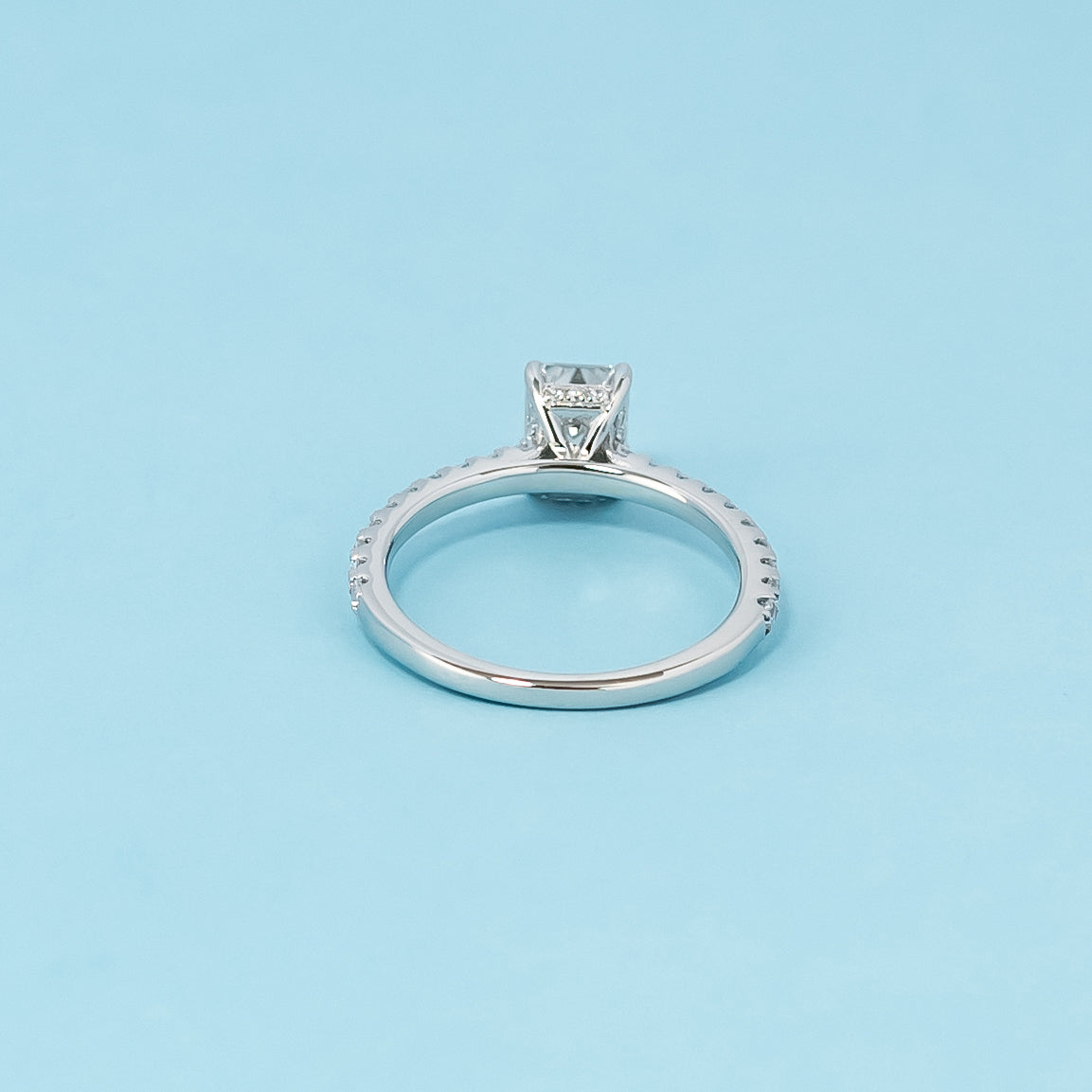 Hidden Elegance Emerald Cut Moissanite Engagement Ring